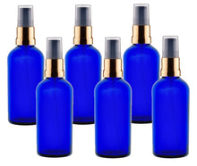 Load image into Gallery viewer, 100ml Blue Glass Bottles with Gold/Black Treatment Pump and Clear Overcap
