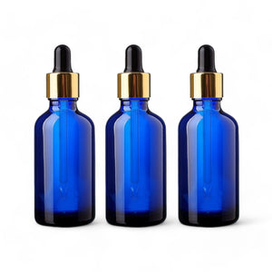 50ml Blue Glass Bottles with Gold/Black Glass Pipettes