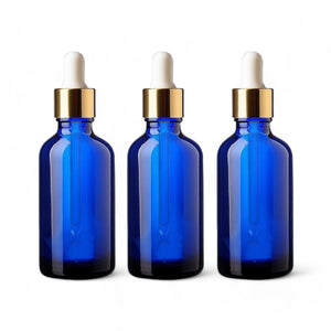 50ml Blue Glass Bottles with Gold/White Glass Pipettes