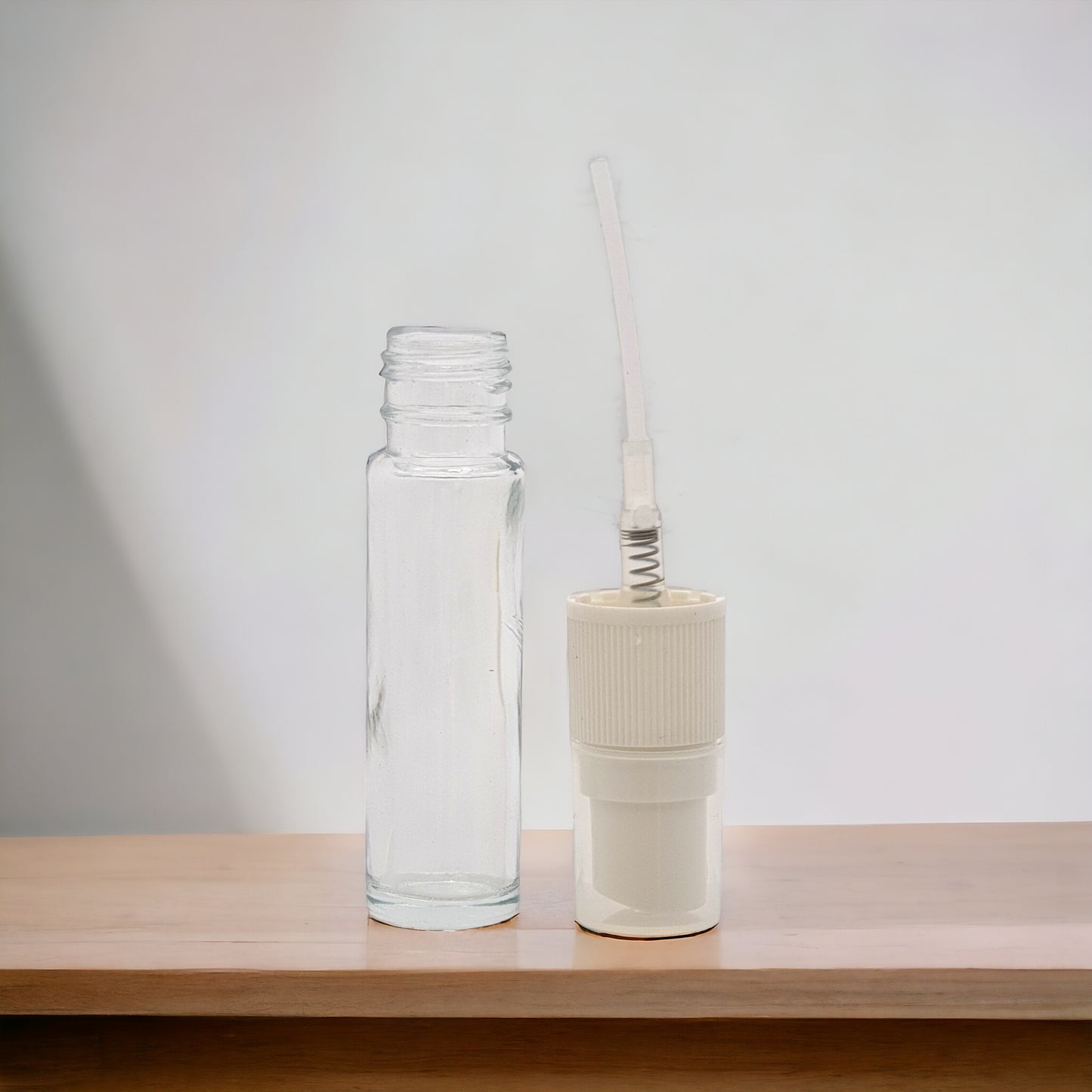 10ml Clear Slim Glass Rollette Bottle with White Finger Spray
