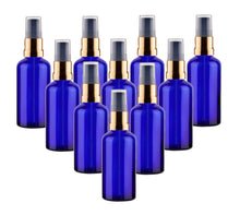 Load image into Gallery viewer, 50ml Blue Glass Bottles with Gold/Black Treatment Pump and Clear Overcap