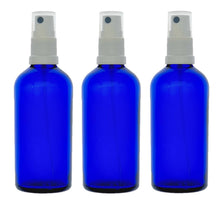 Load image into Gallery viewer, 100ml Blue Glass Bottles with White Atomiser Spray and Clear Overcap
